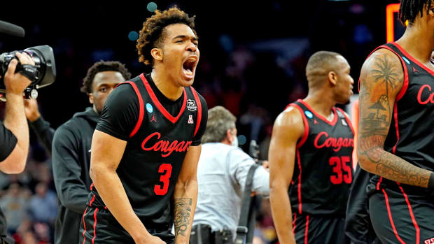 Mar 24, 2022; San Antonio, TX, USA; Houston Cougars guard Ramon Walker Jr. (3) celebrates after beating the Arizona Wildcats in the semifinals of the South regional of the men’s college basketball NCAA Tournament at AT&T Center.